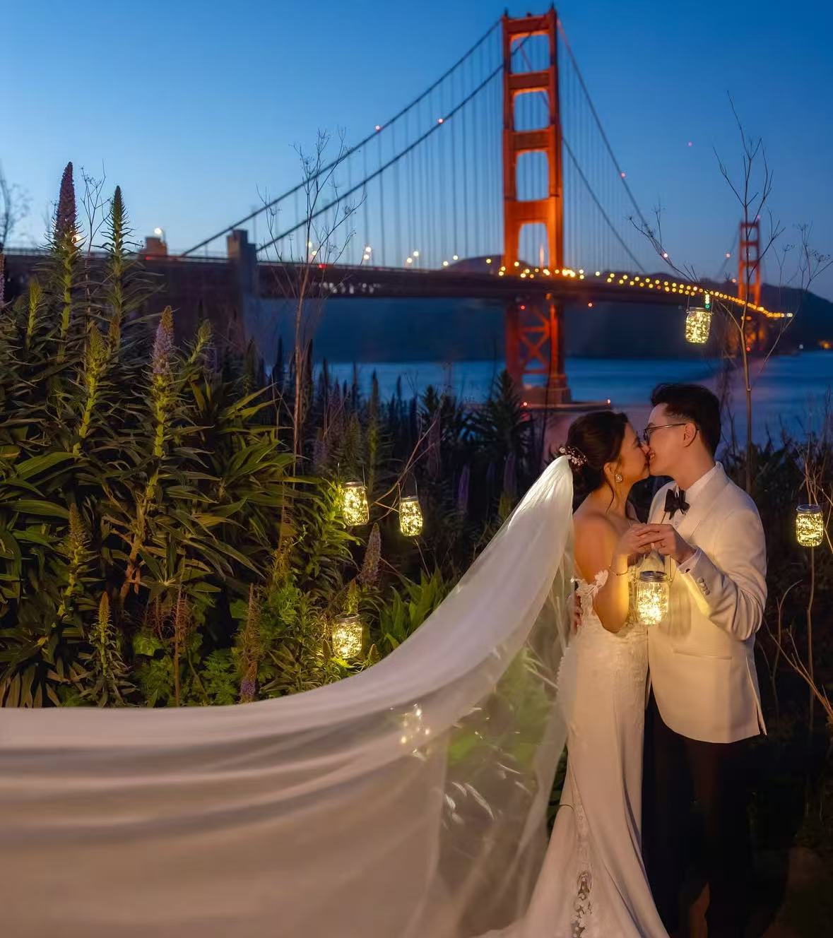 Couple at Golden Gate Bridge at dusk