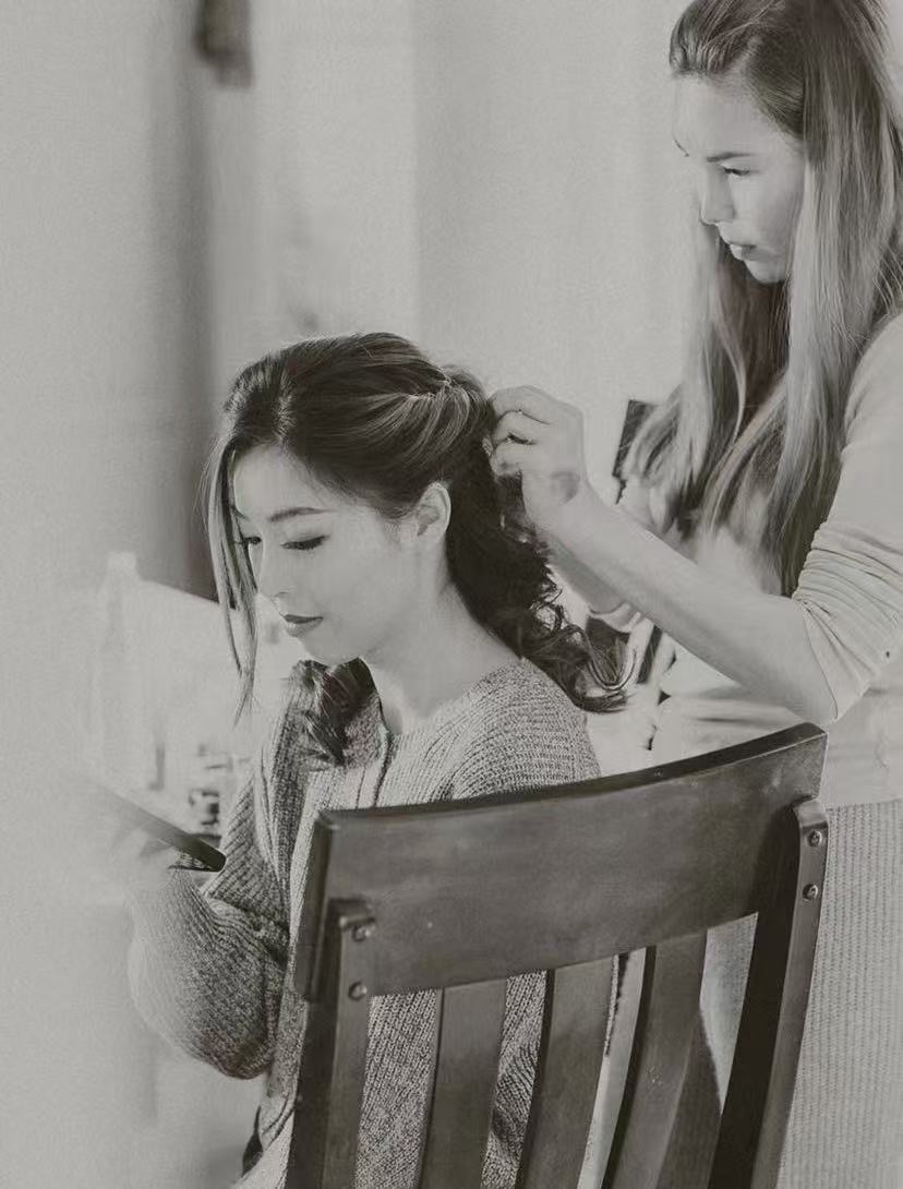 Pamela styling a bride's hair