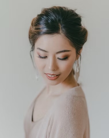 Soft glam bridal makeup portrait with updo